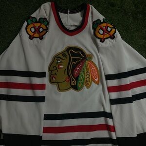CCM White Jersey with Black and Red Stripes